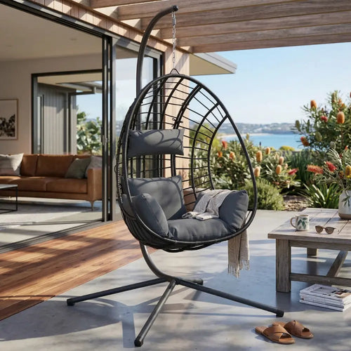 Anthracite Hanging Egg Chair with Stand and Cushion on Patio