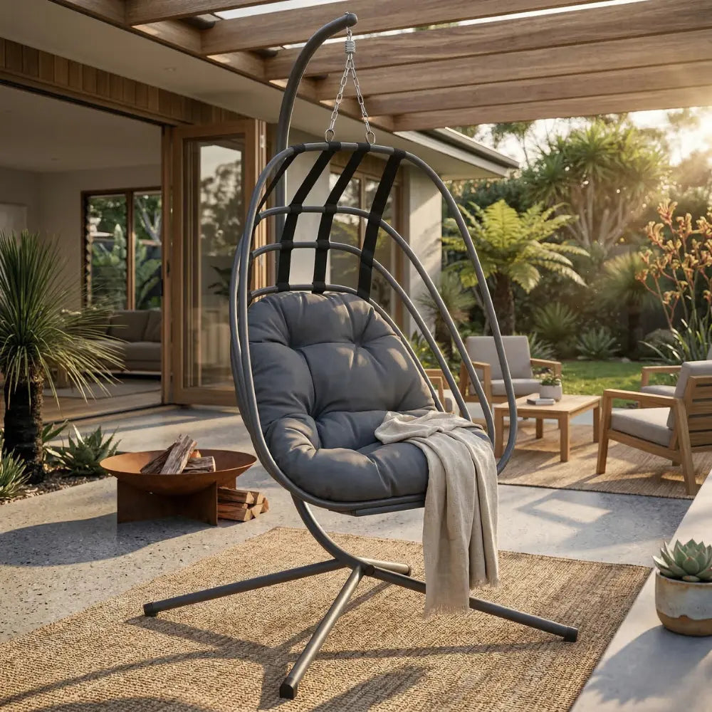 Anthracite Hanging Egg Chair with Stand and Cushion on Patio