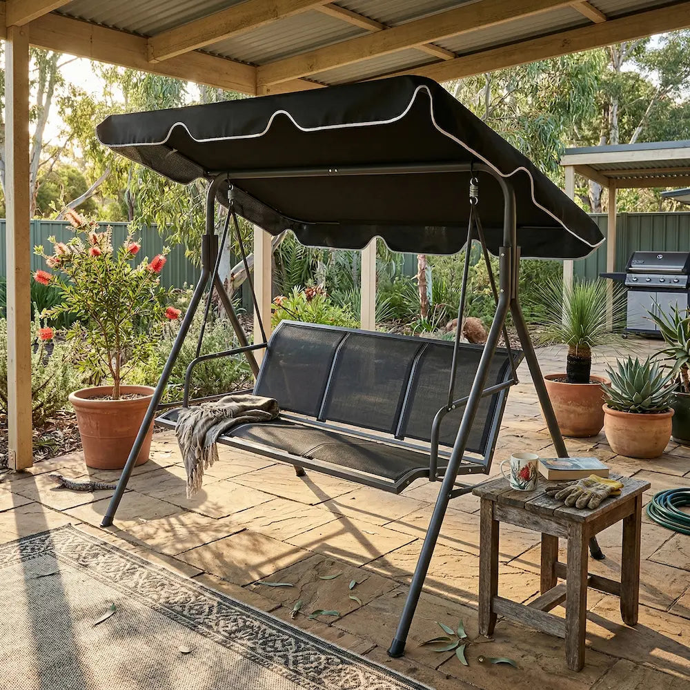Black Outdoor Garden Swing Bench with Canopy on Australian Garden Patio